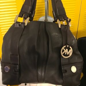 Michael Kors brown leather handbag.